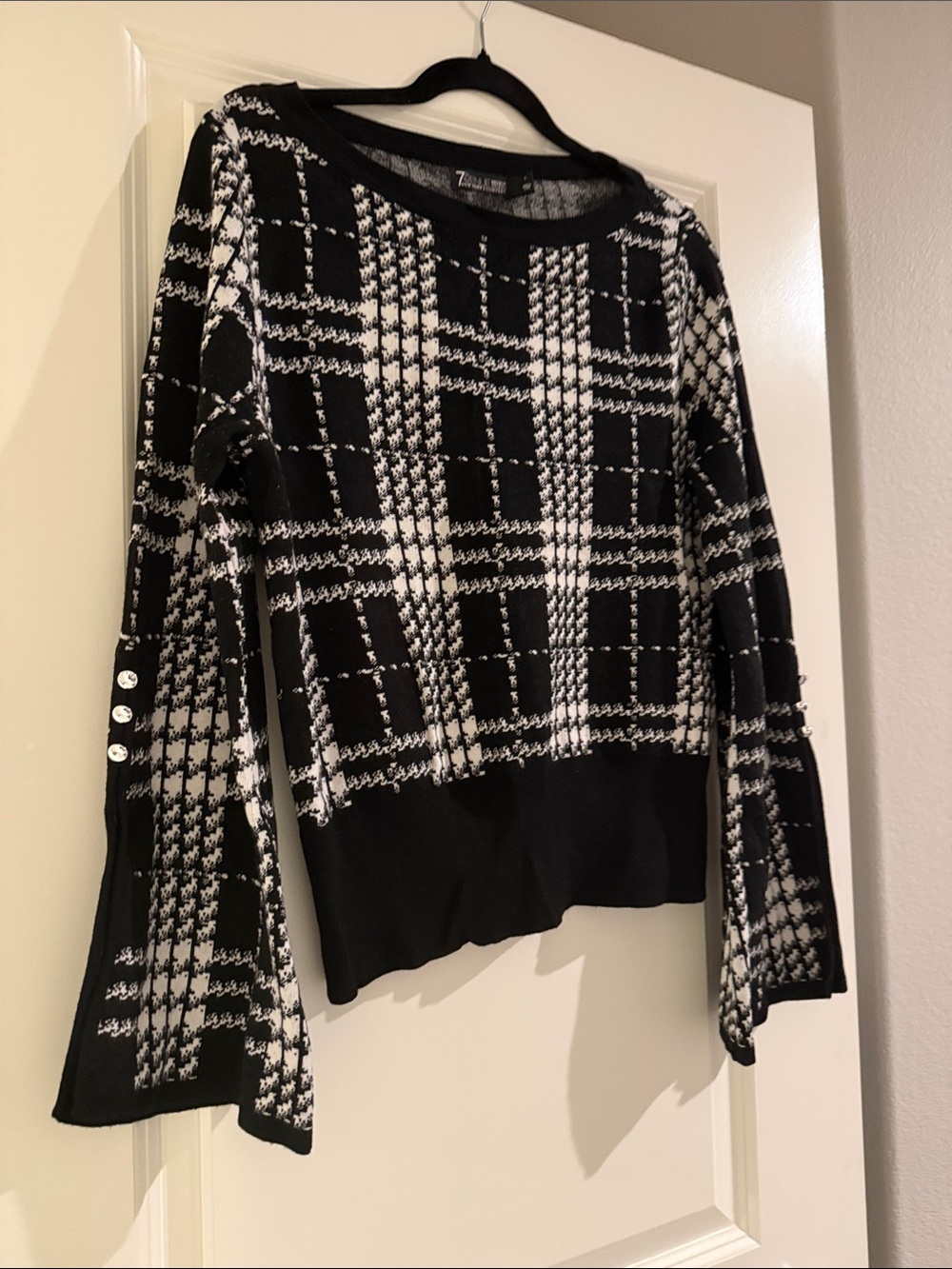 New York & Company Black & White Plaid Crew Neck Sweater with Button Cuff